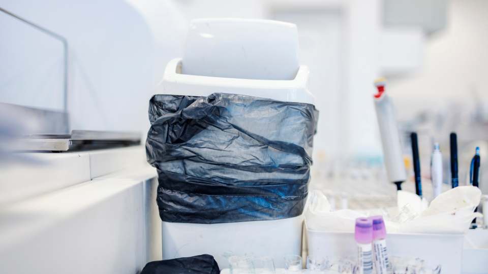 lab waste stored in bin