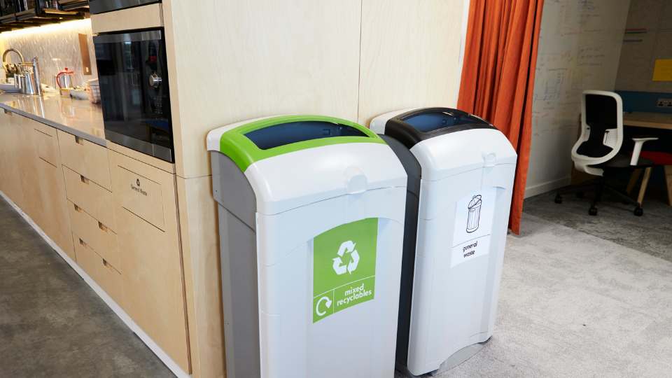 general waste and recycling bins in office
