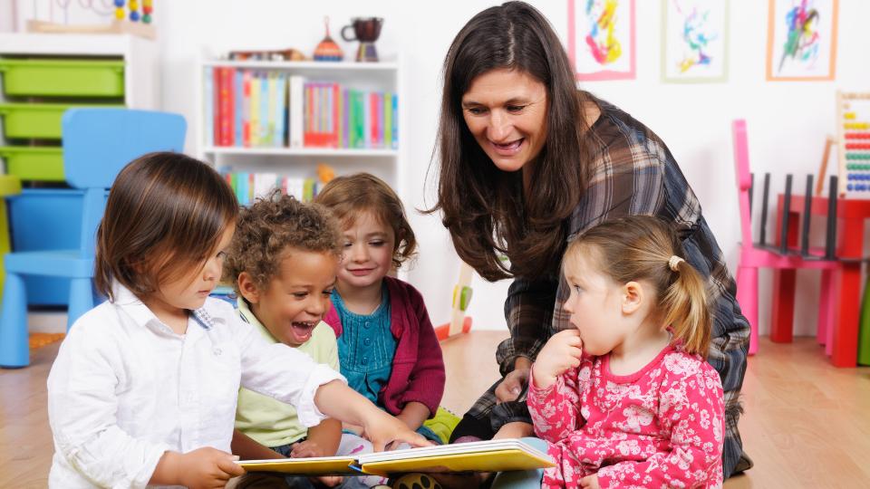 nursery with children and teacher