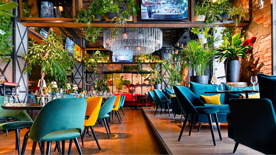 photograph of a restaurant in england. it has nice decorations and is sunny.