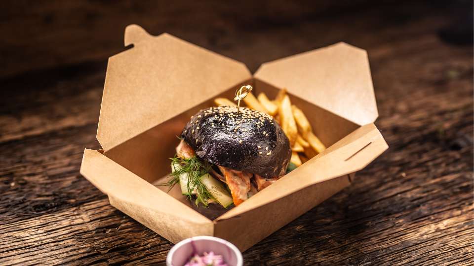 Takeaway burger in cardboard packaging