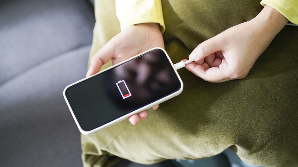 IPhone being recharged.